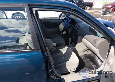 2001 Toyota Corolla Le z USA, uszkodzony, nr VIN 2T1BR12EX1C420630